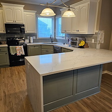 Two-toned-cabinets-for-this-Shawnee-Ks-kitchen 0